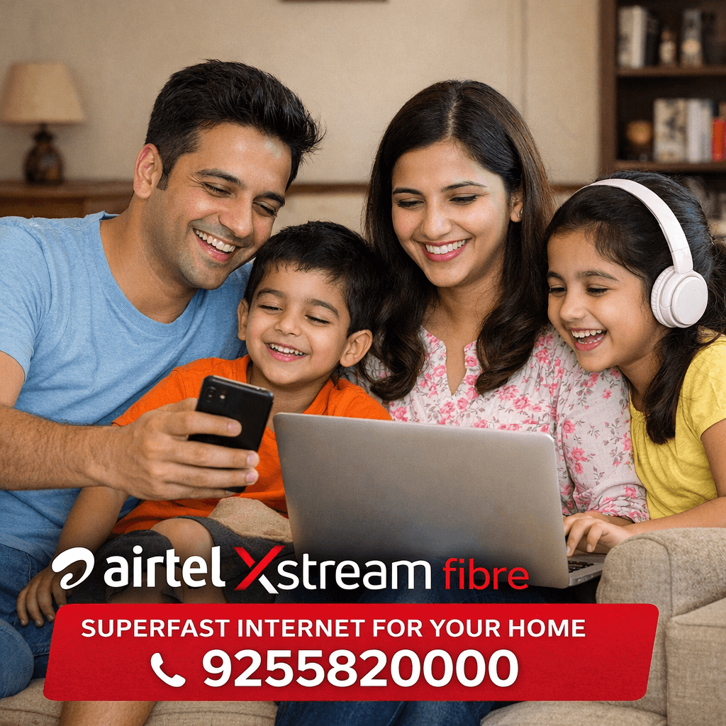 Smiling family of four using a laptop and smartphone for Airtel Xstream Fibre internet.